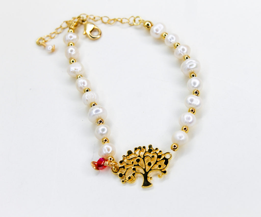 Pearl bracelet with gold tree charm 