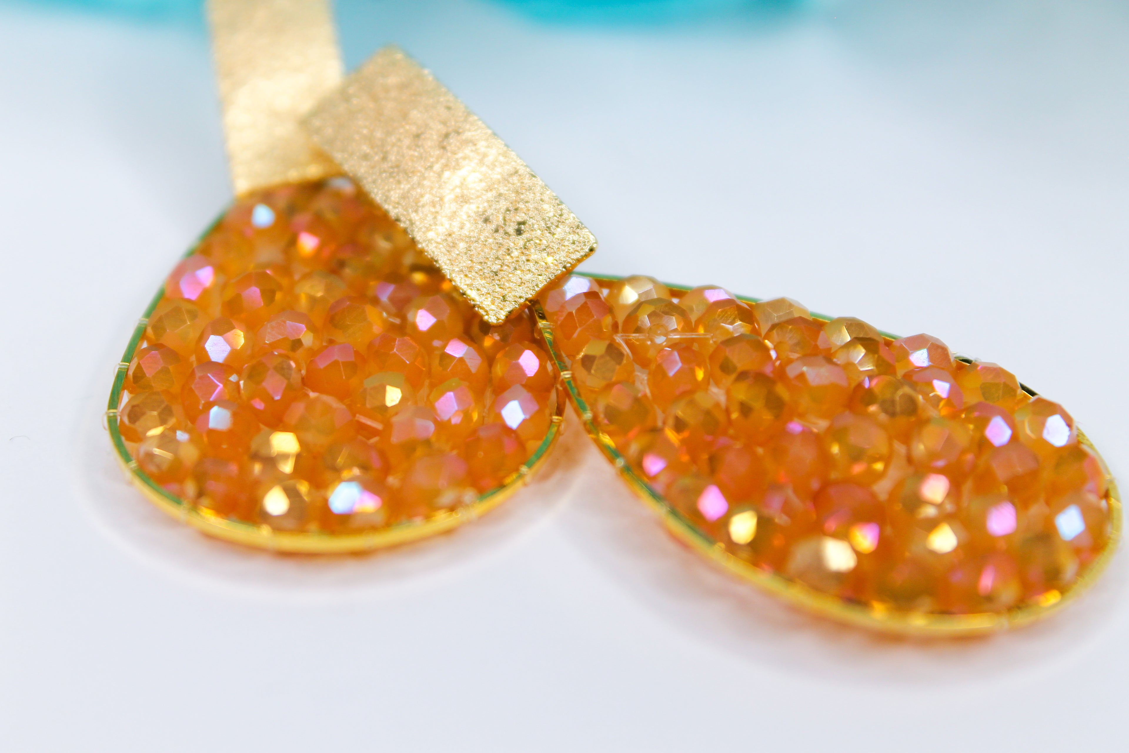 Orange teardrop-shaped earrings
