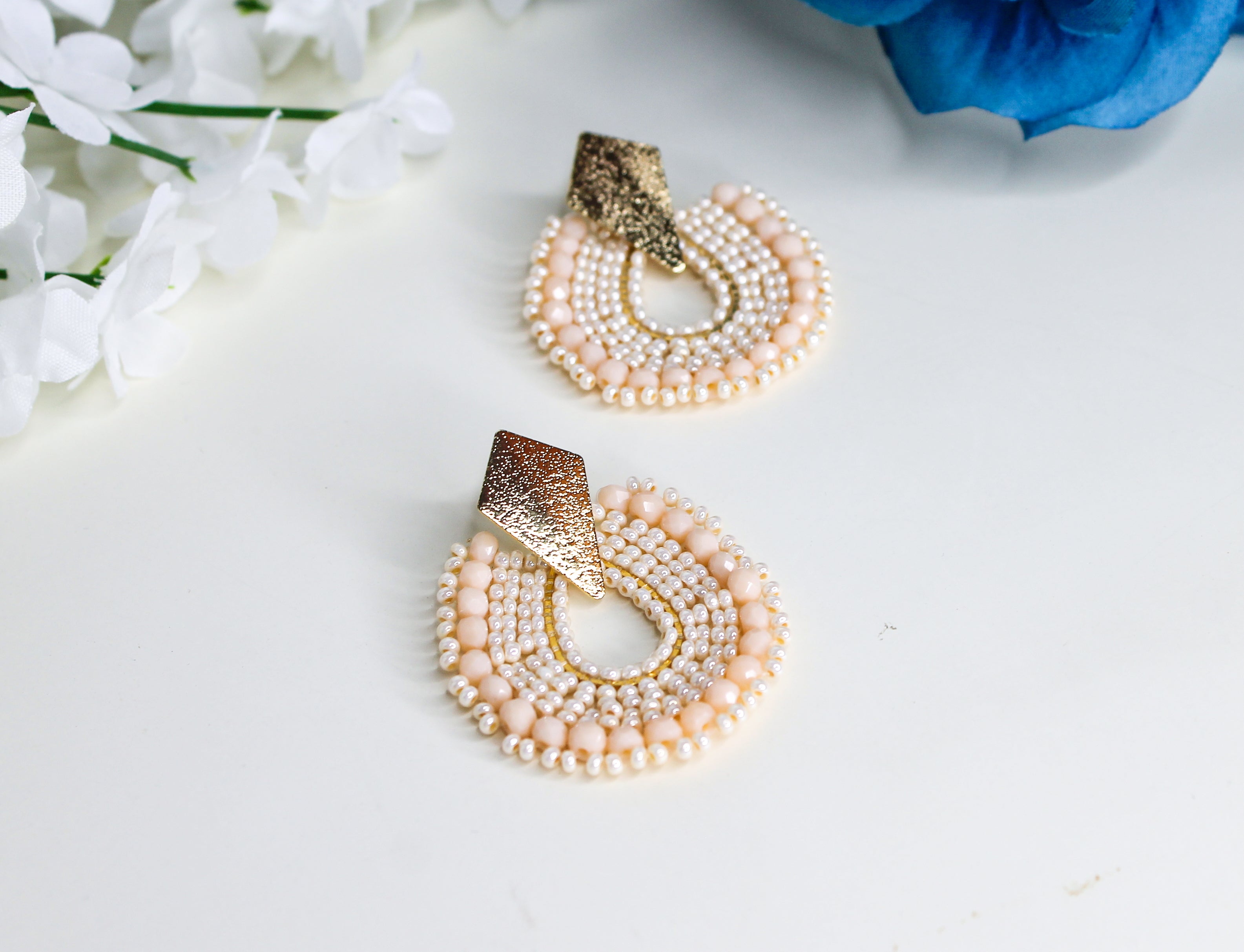 cream beaded earrings