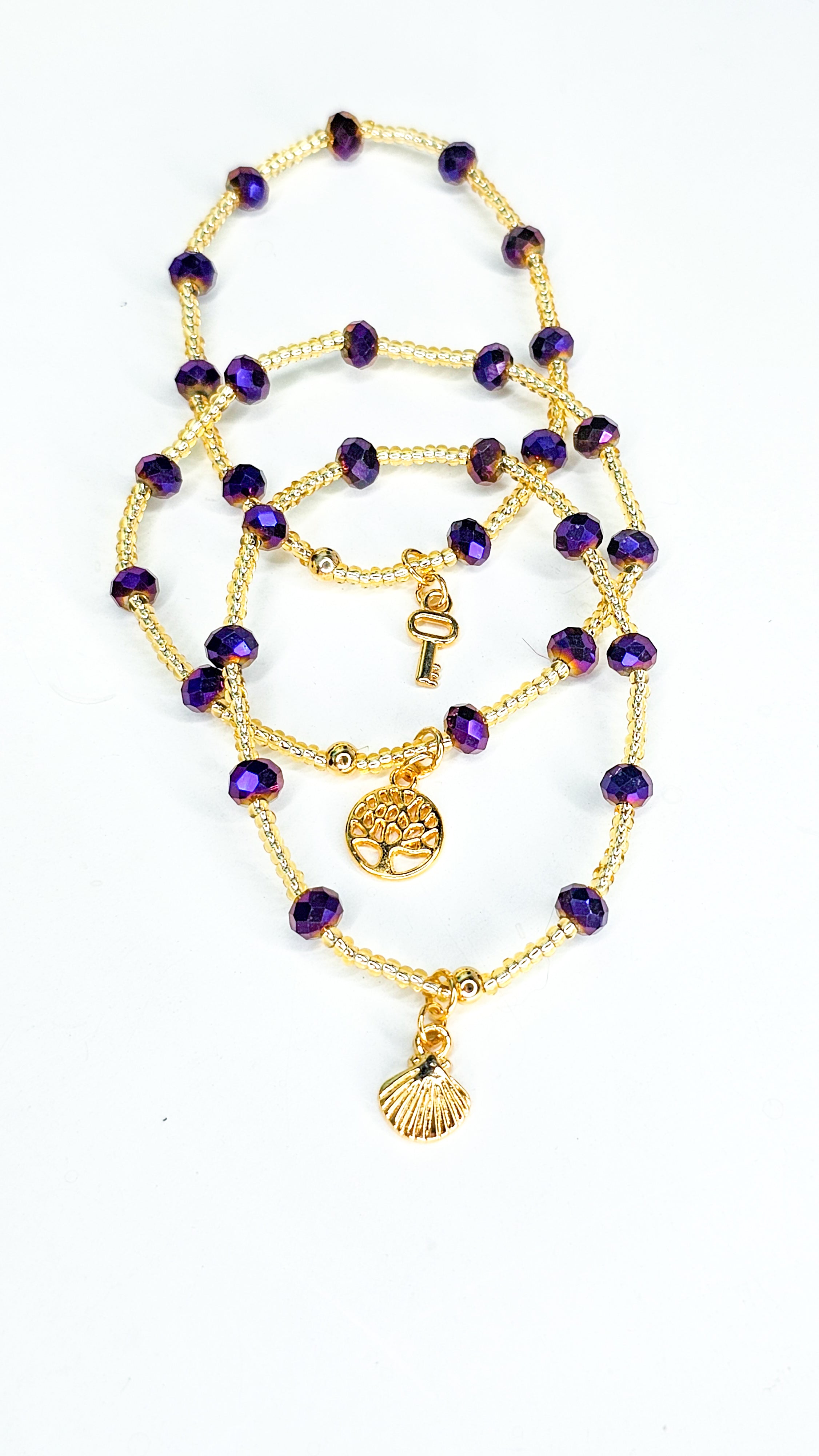 purple and gold bracelet set