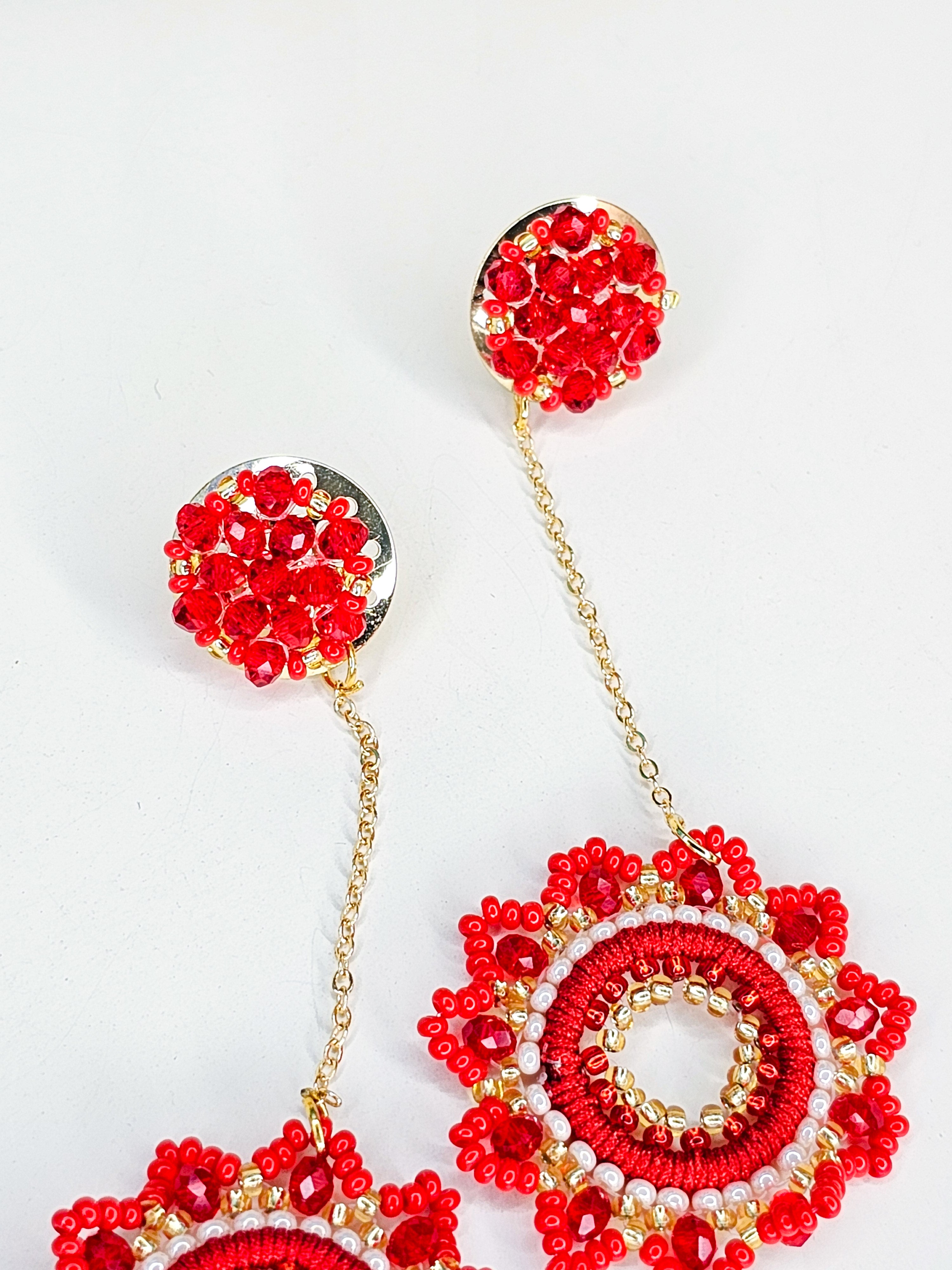 Red beaded earrings with gold accents