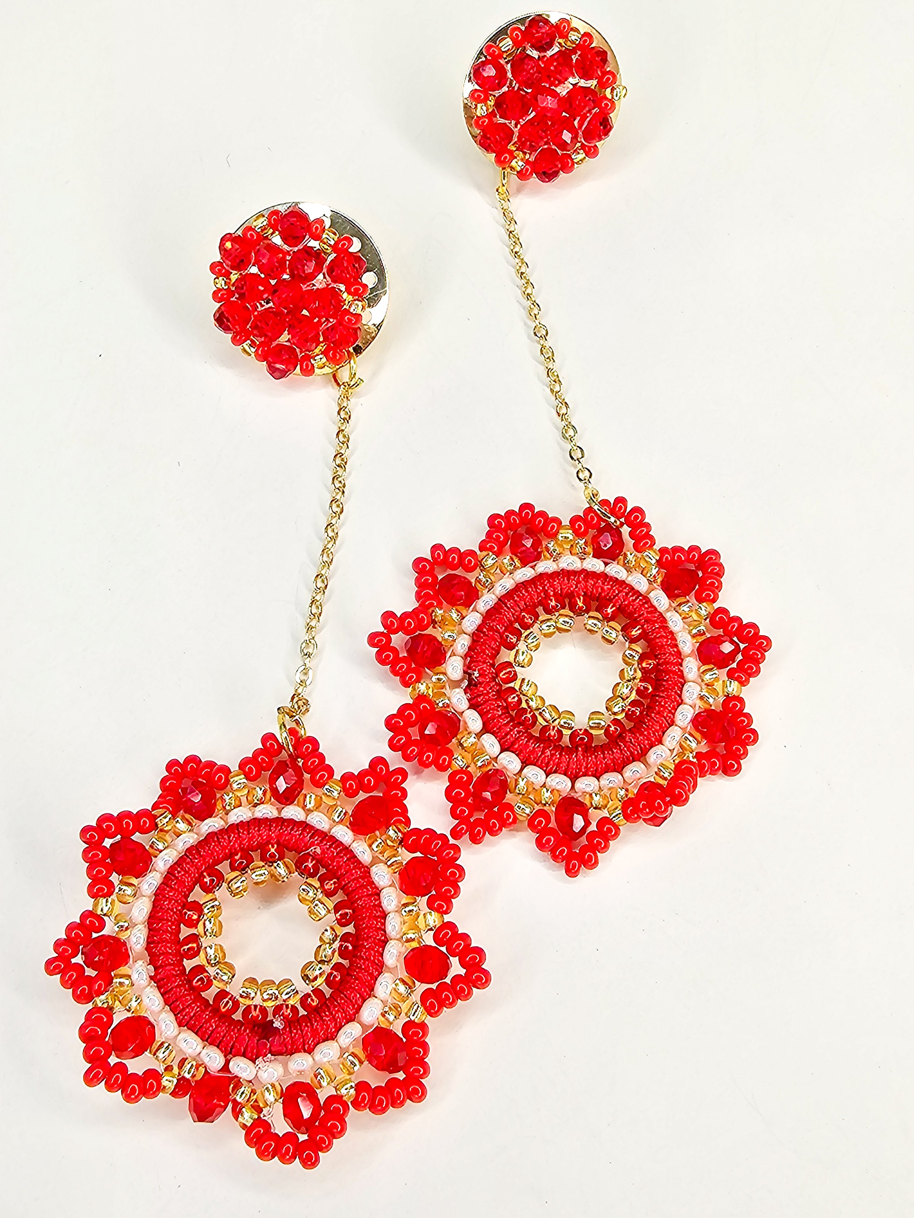 Red beaded earrings with gold accents