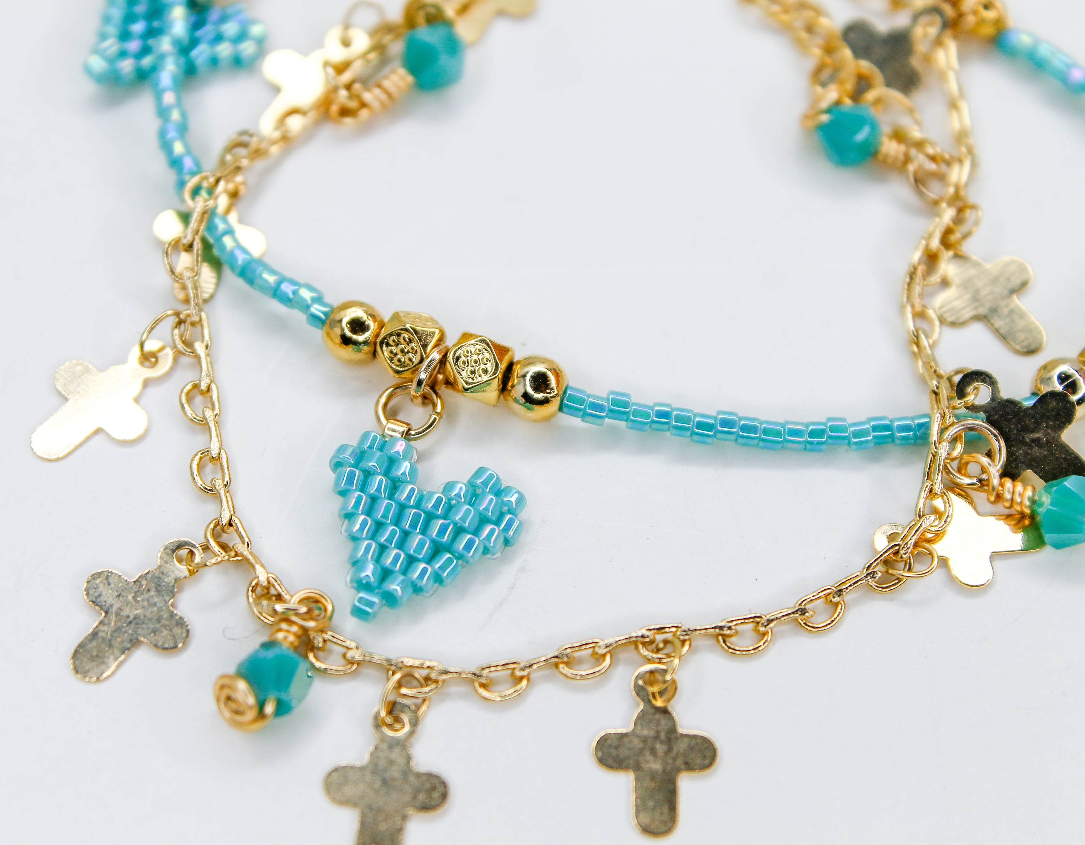 Turquoise and gold charm bracelets 