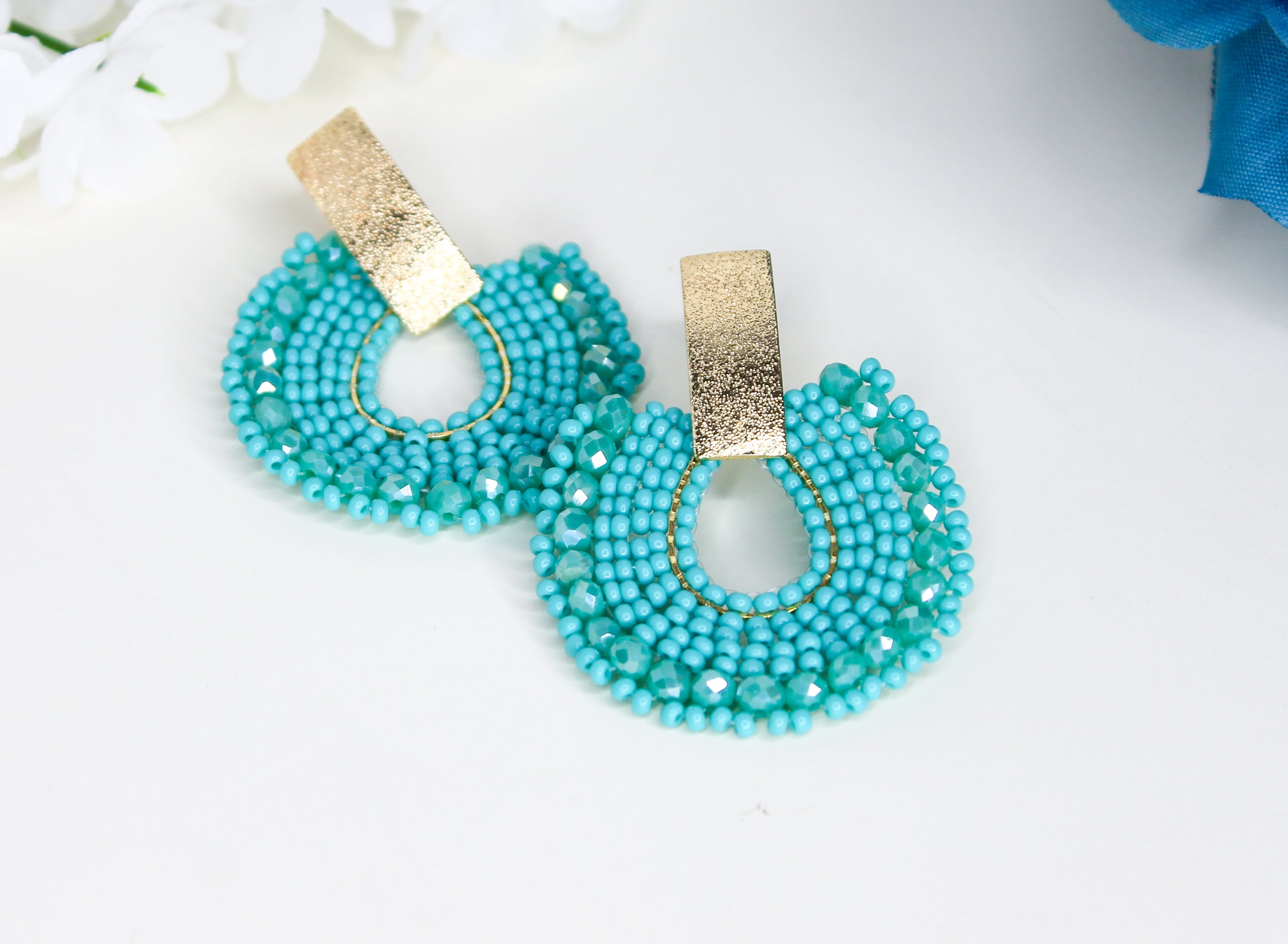 Turquoise beaded earrings with gold accents
